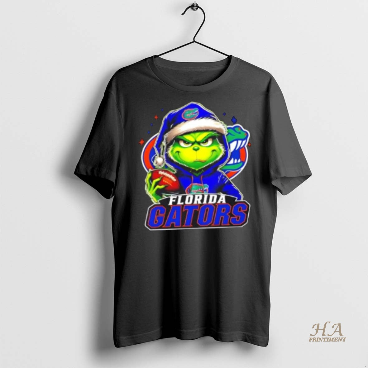 Official Grinch Is Holding A Ball And Smiling At Florida Gators Fans Christmas Shirt