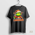 Official Grinch Is Holding A Ball And Smiling At Texas Longhorns Fans Christmas Shirt