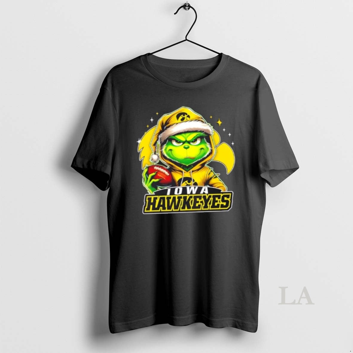 Original Grinch Is Holding A Ball And Smiling At Iowa Hawkeyes Fans Christmas