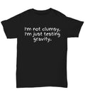 not clumsy, testing gravity - Unisex Tee