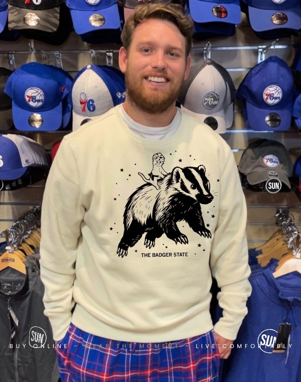 Cat cheesehead riding the badger state shirt