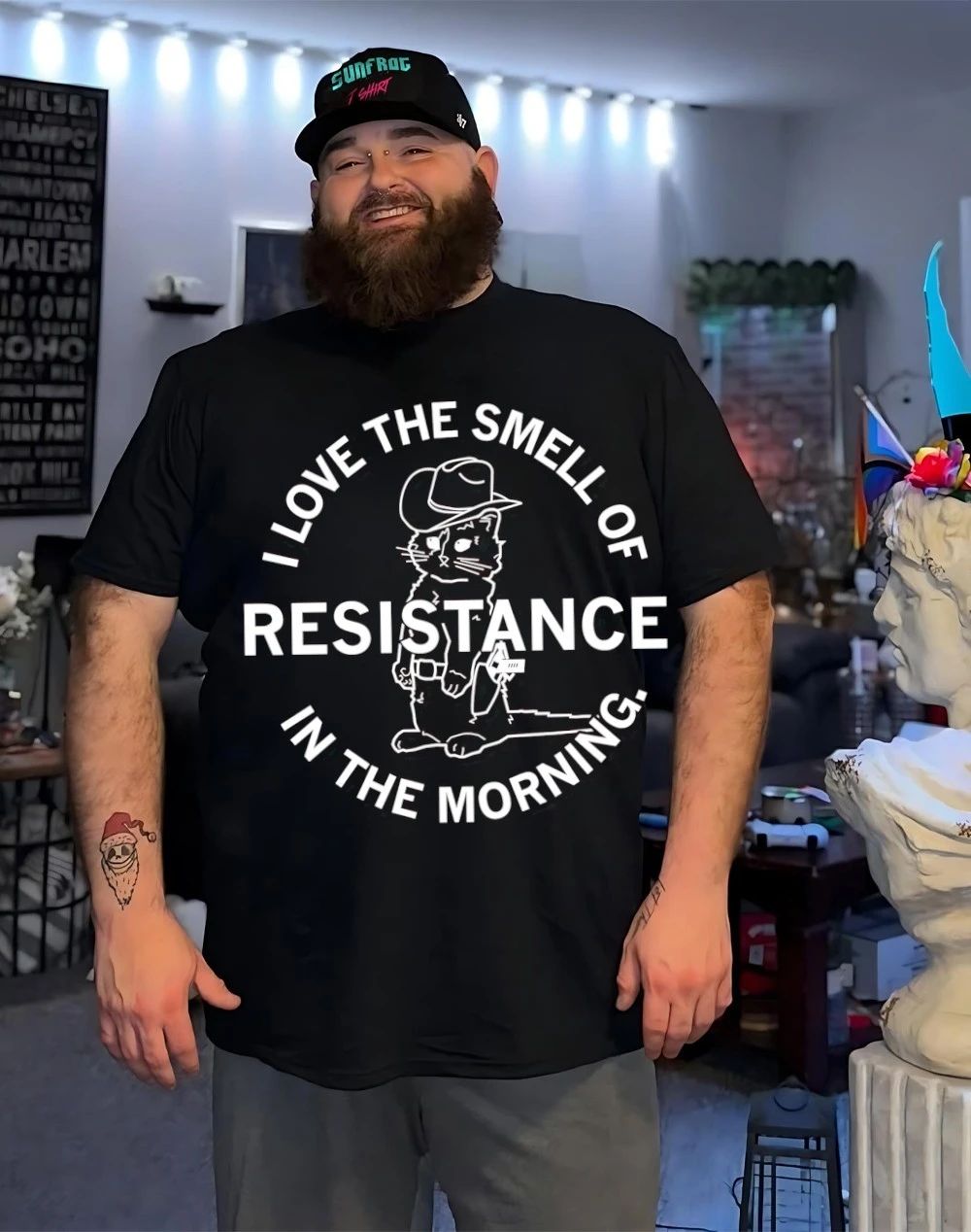 Cat loves the smell of resistance in the morning shirt