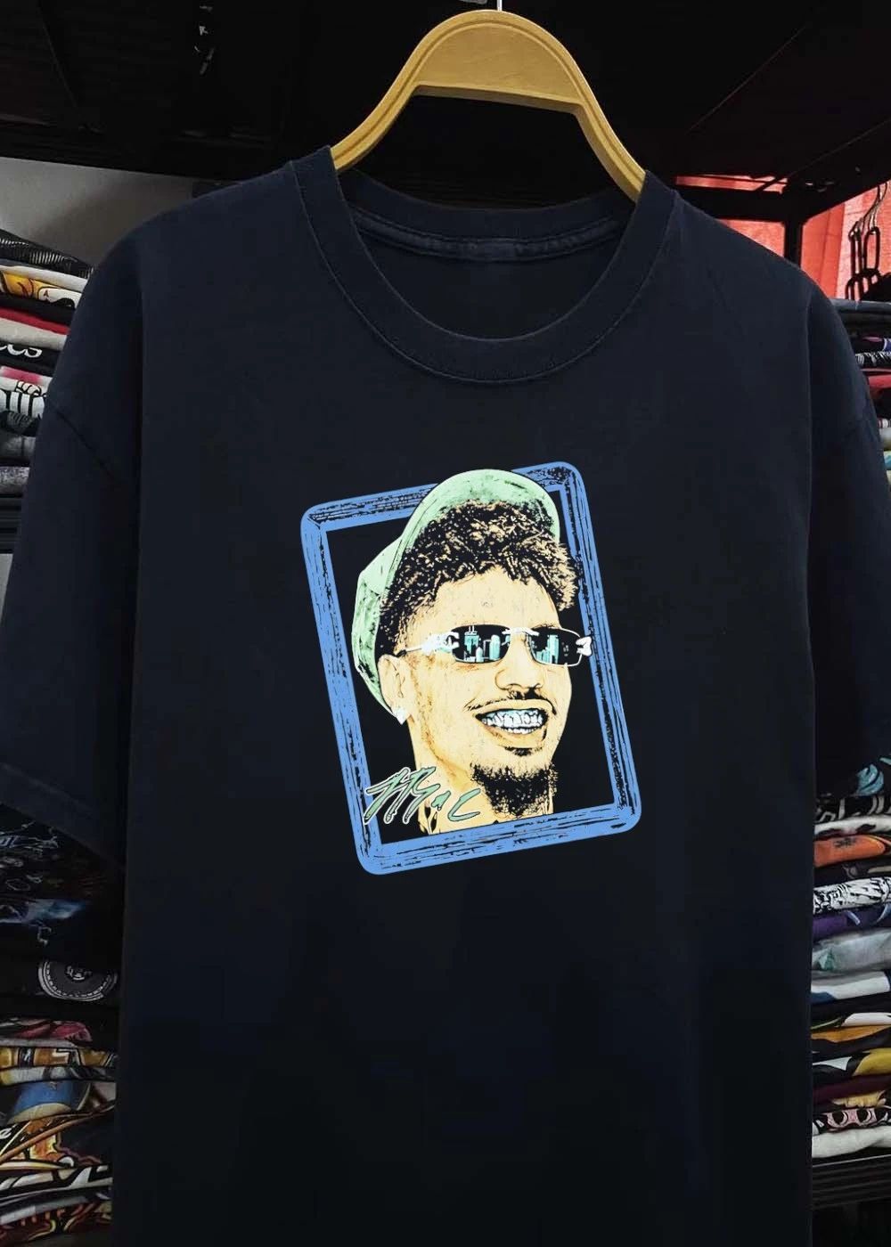 Man with sunglasses and grillz portrait shirt