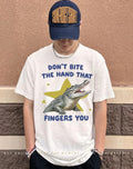 Crocodiles don’t bite the hand that fingers you shirt